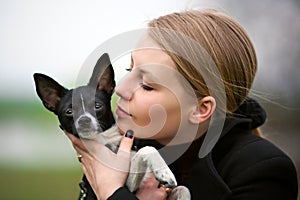 Girl kisses small pawl photo