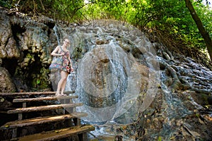 Girl on Kuang Si waterfall