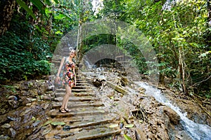 Girl on Kuang Si waterfall