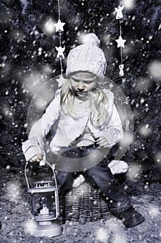 Girl with lantern and snow