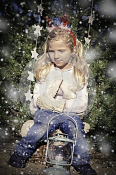 Girl with lantern and snow