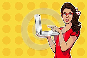 Girl with laptop in the handpointing with finger on it. Digital advertisement. Some news or sale concept. Wow, omg emotion.