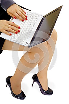 Girl with laptop on lap