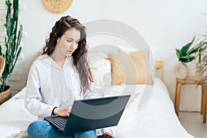 Girl with laptop in the room