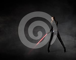Girl with laser sword on hand
