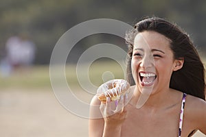 Girl laugh with Doughnut