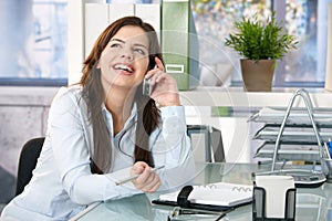 Girl laughing speaking on phone