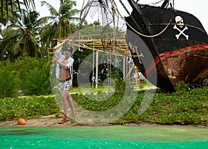 Girl launching pirates boat, journey.