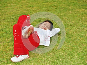 Girl Laying on Grass