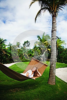 Girl laying in hammok
