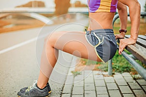 The girl leads a healthy lifestyle doing fitness outdoors.