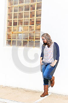 Girl Leaning Against Wall