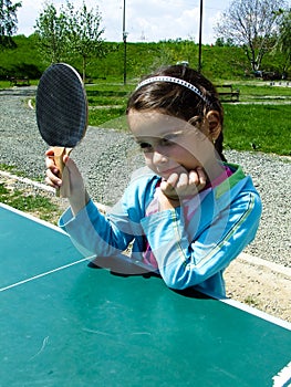 Girl learn to play ping-pong