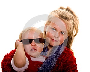 Girl with Lei and Baby with Sunglasses