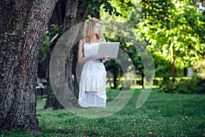 Girl levitates with laptop