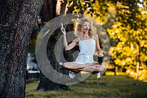 Girl levitates in nature