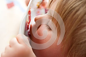 Girl licking plate clean