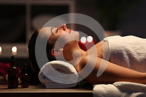 Girl lies at home under after beauty spa procedure