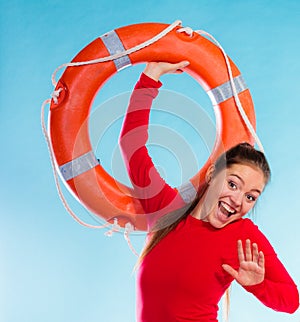 Girl lifeguard with rescue equipment