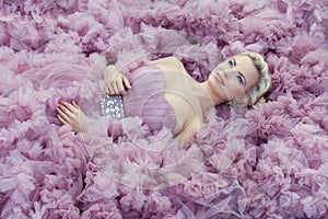 Girl in light pink dress.