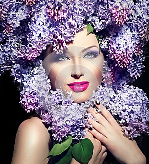 Girl with lilac flowers hairstyle