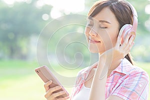 Girl listen music with earphones
