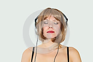 Girl listen to music on headphone