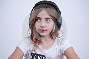 Girl listening a music on headphone