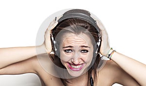 Girl listening to music and grinning
