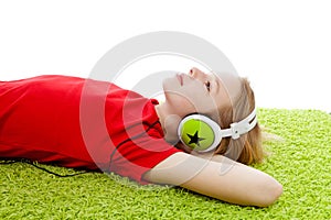 Girl is listening to music with headphones on