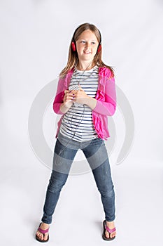 Girl listening to music on headphones