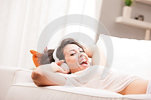 Girl listening to music in her house dancing