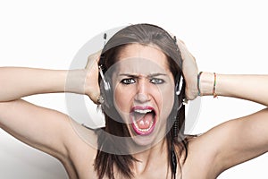 Girl listening to music and screaming