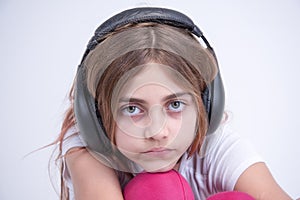 Girl listening to sad music on headphone