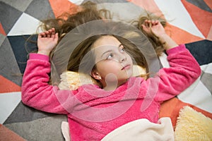 Girl little child relax at home. Evening relaxation before sleep. Child care concept. Pleasant time relaxation. Mental