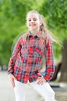 Girl little cute child enjoy walk on windy day nature background. Feeling cozy and comfortable on windy day. Deal with