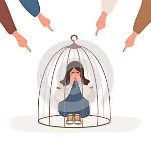 Girl locked in cage. Fingers pointing on sad muslim woman. Depressed teenager in hijab hugging knees and crying. School