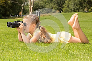 Girl Lokking in Binoculars