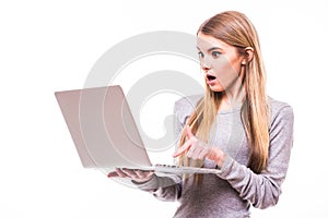 Girl look shoked in laptop on white photo