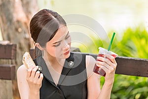 Girl looking feeling suspicious about food rot or strange taste