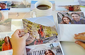 Girl looking at her printed photos, remember nostalgia for a day of rest