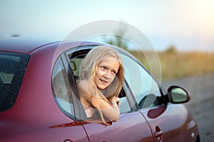 Girl looking out the car