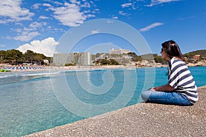 Girl Looking at Paguera Beach, Mallorca photo