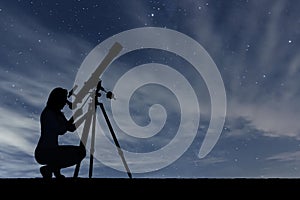 Girl looking at the stars with telescope. Starry night sky