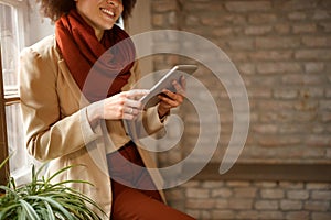 Girl looking surfing internet on iPad