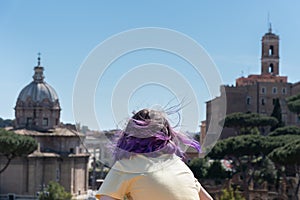 Girl looking to Rome from Mercato di Traiano