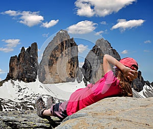 Girl looking at the Tre cime di Lavaredo photo