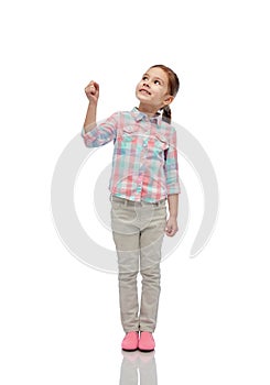 Girl looking up and holding something invisible