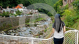 Girl looking up the valley of the East Lyn River