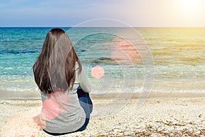 Girl looks at the sea